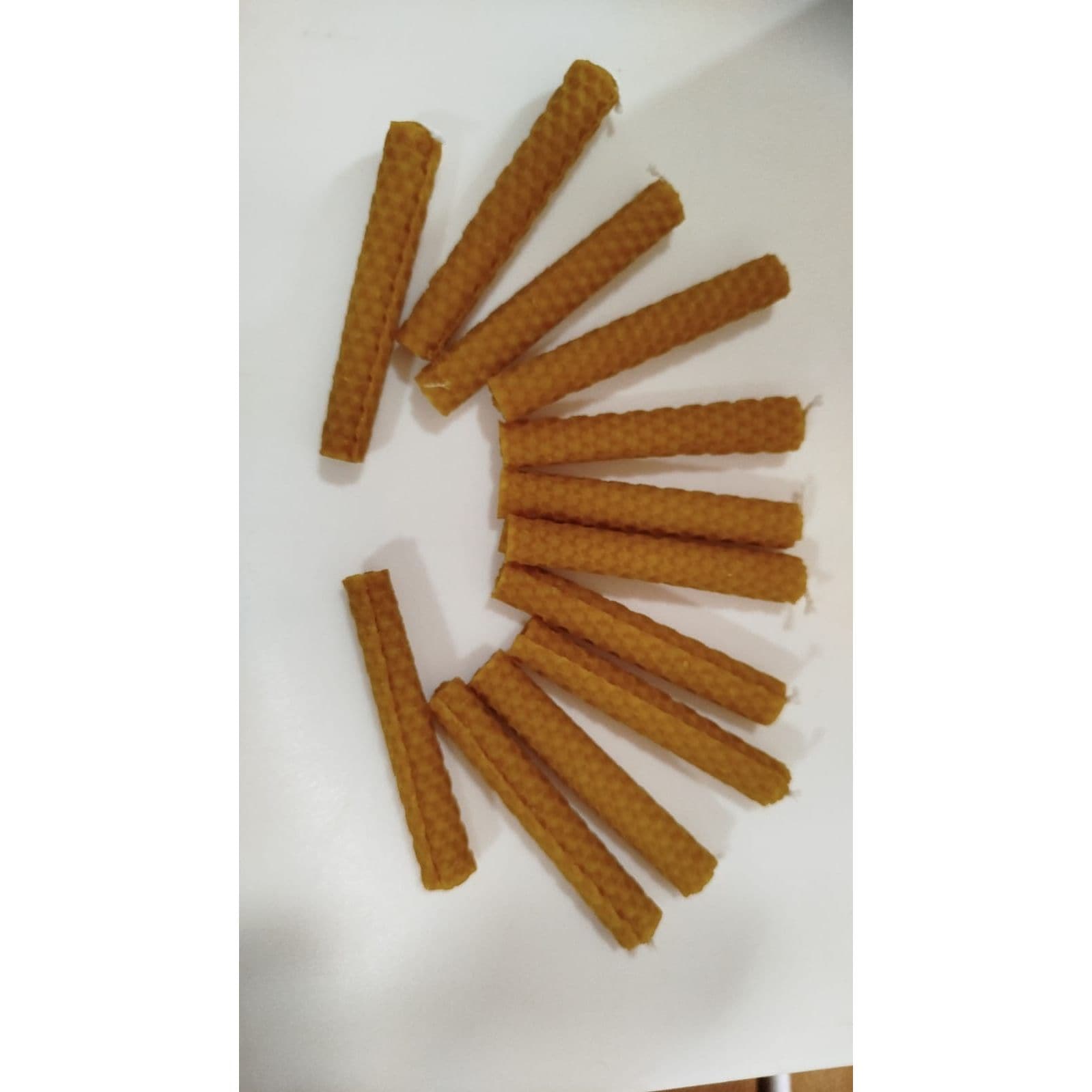 12 velas de miel de 10cmpor1cm